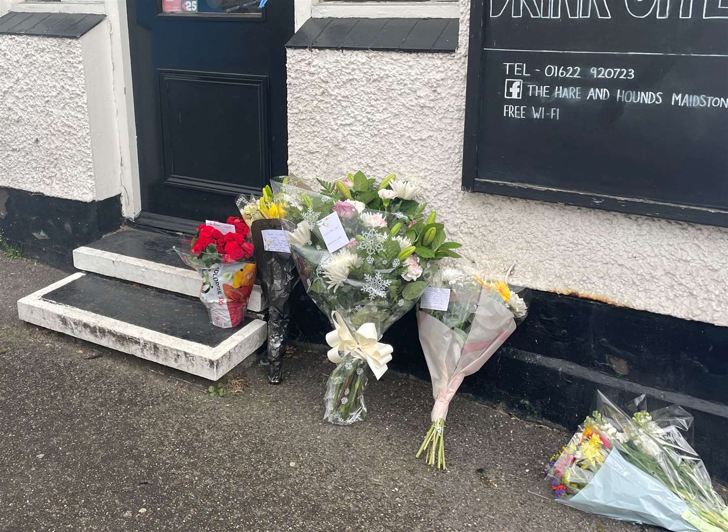 Floral tributes left at the pub after landlord Matthew Bryant died