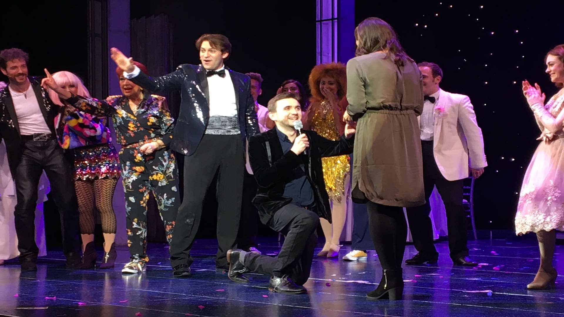 Kevin gets down on one knee at the end of the performance. Picture: Orchard Theatre