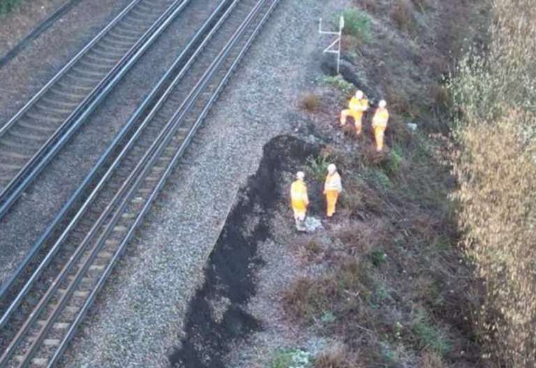 Engineers at the scene of the landslip in Newington at the weekend. Picture: Southeastern