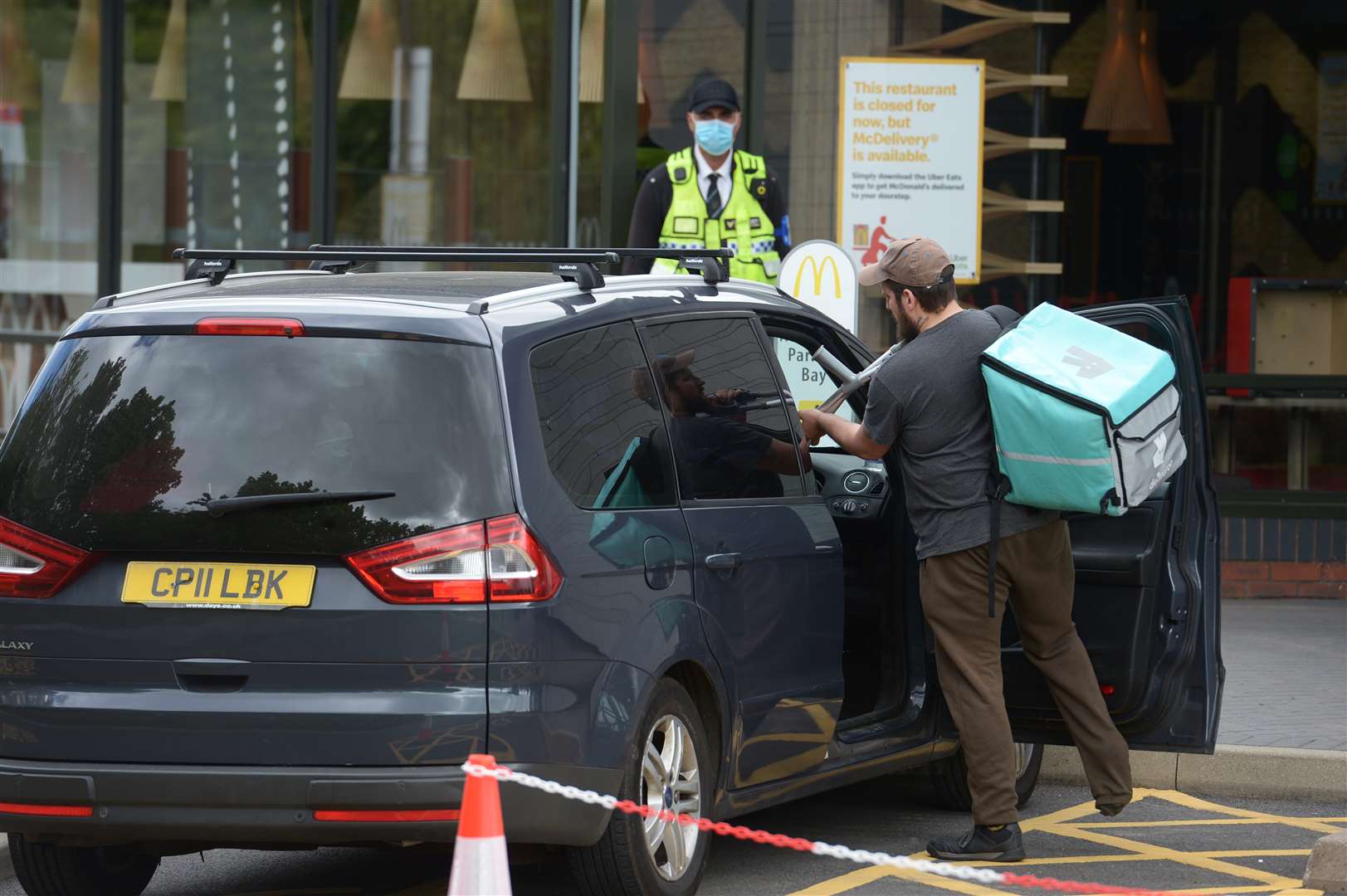 The first delivery leaves the McDonald’s in Boreham (Nick Ansell/PA)