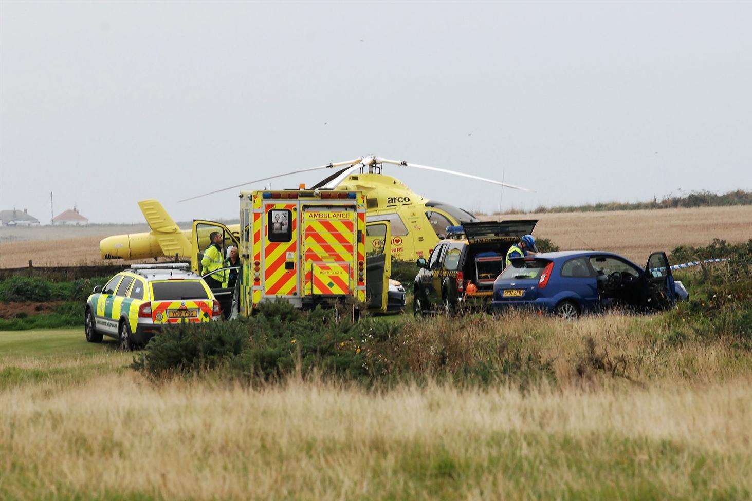 Emergency crews at the scene of the helicopter crash. Picture: Ross Parry/SWNS Group