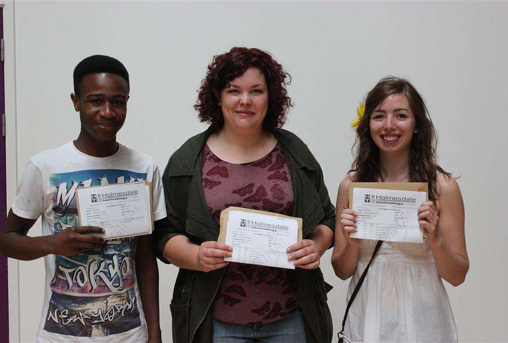 It's A-level joy for Holmesdale Technology College students David Omotayo, Katie Millgate and Bethany Smit