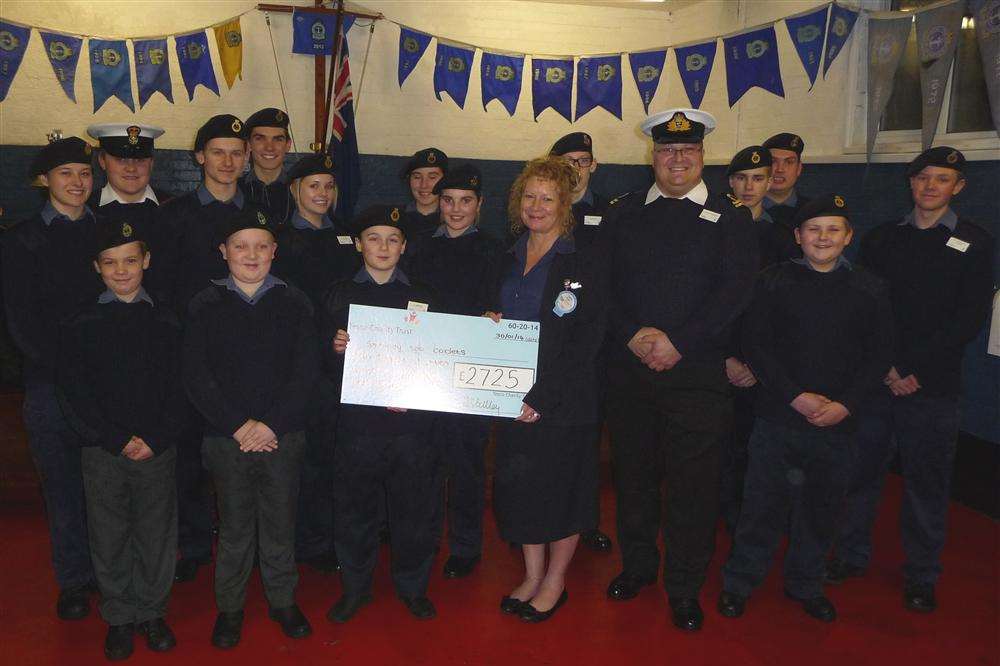 Sheppey Sea Cadets receiving a cheque for a new rowing boat