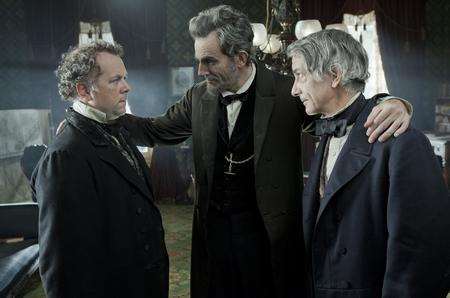 (l-r) David Constable as Representative James Ashley, Daniel Day-Lewis, President Abraham Lincoln and David Strathairn as Secretary of State, William Seward, in Lincoln. Picture: PA Photo/Fox Australia Film