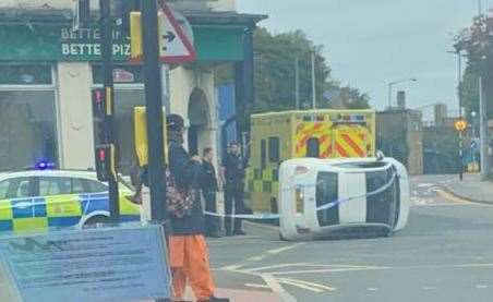 A car overturned last month after crashing into a metal bollard in London Road, Strood, near Papa John's Pizza takeaway. Picture: Liv Hopkins