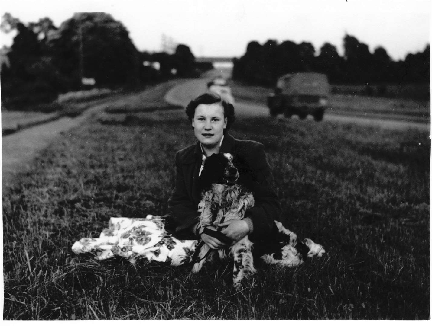 Verity Rowbottom, pictured in 1953 with her aunt's dog at Springhead Nurseries, next to what is now the A2 (6705063)