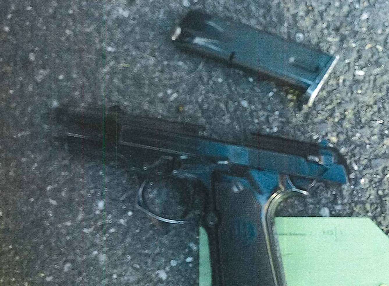 A handgun discarded after the raid