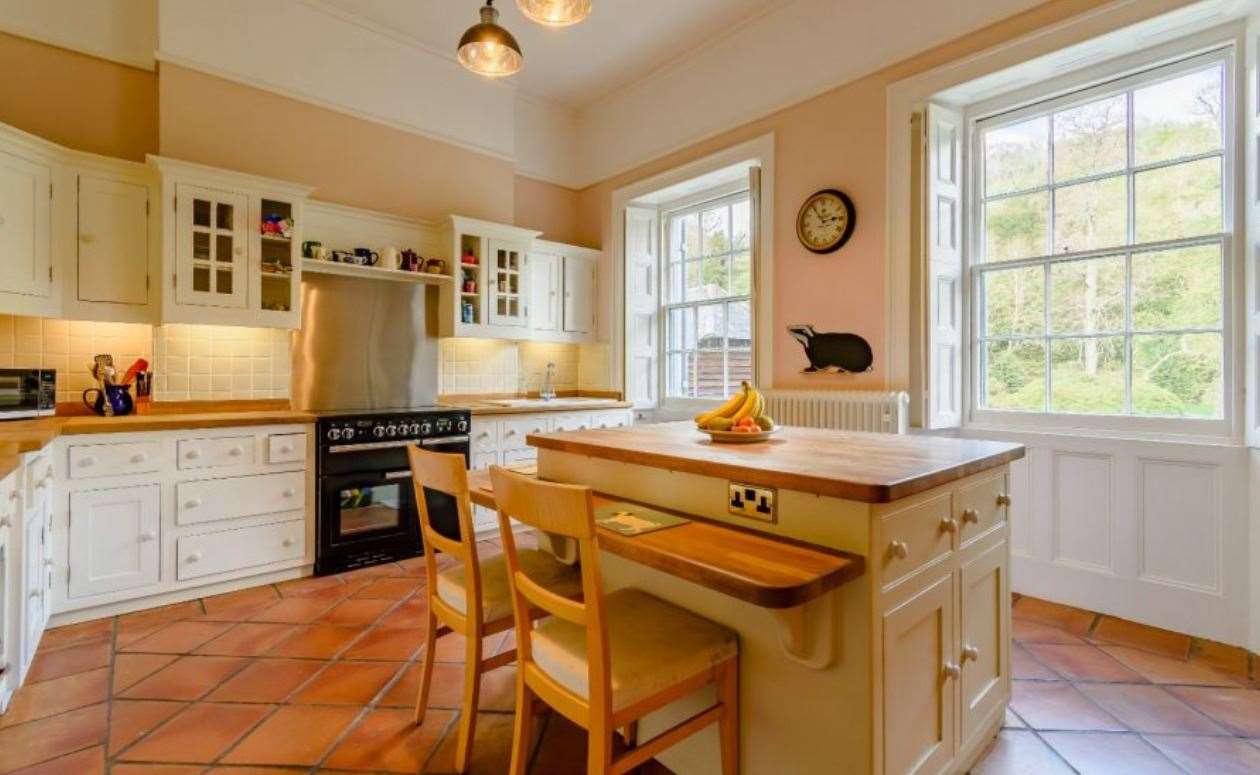 The country kitchen fits perfectly with the property's rural location. Picture: Strutt and Parker