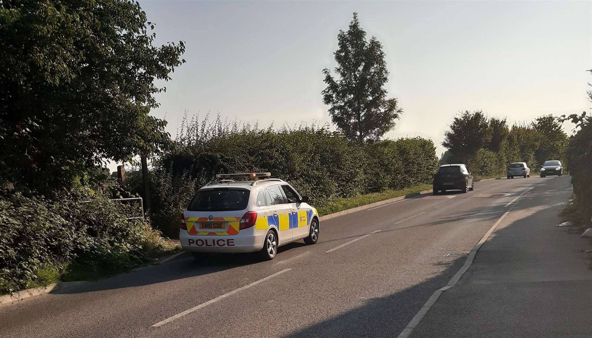 Police at a footpath off Swanstree Avenue, Sittingbourne, which leads to orchards in Highsted Road