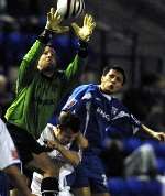 Luis Cumbers challenges Tranmere keeper Danny Coyne. Picture: MATTHEW WALKER