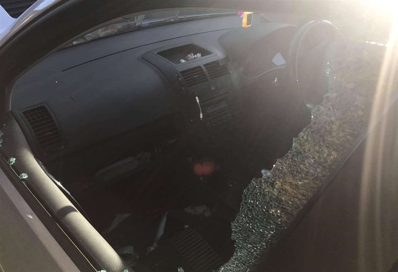 Numerous vehicles have suffered smashed windows