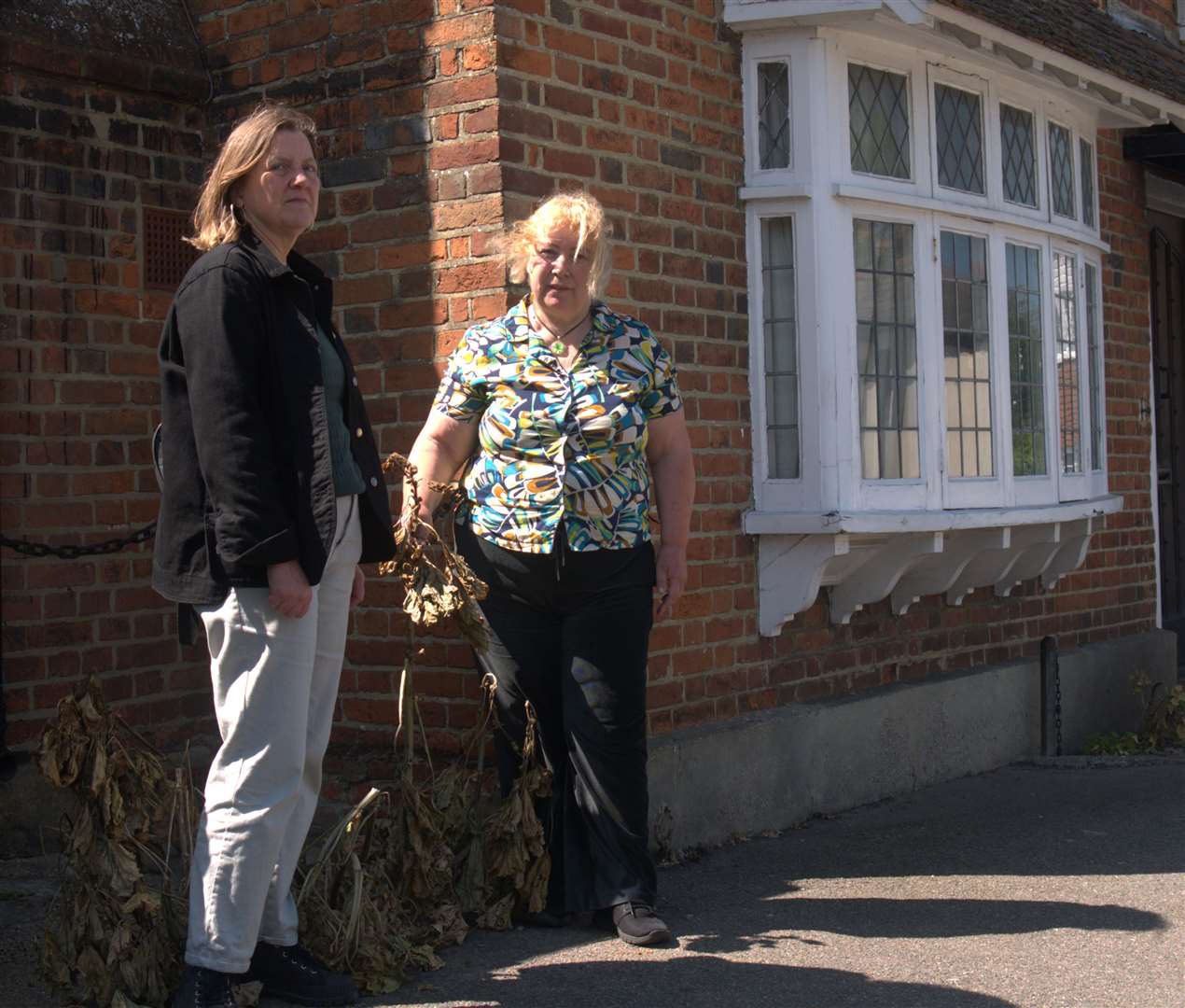 Cllr Clare Turnbull and Susan Mortimer survey the damage to the plants in Whitstable