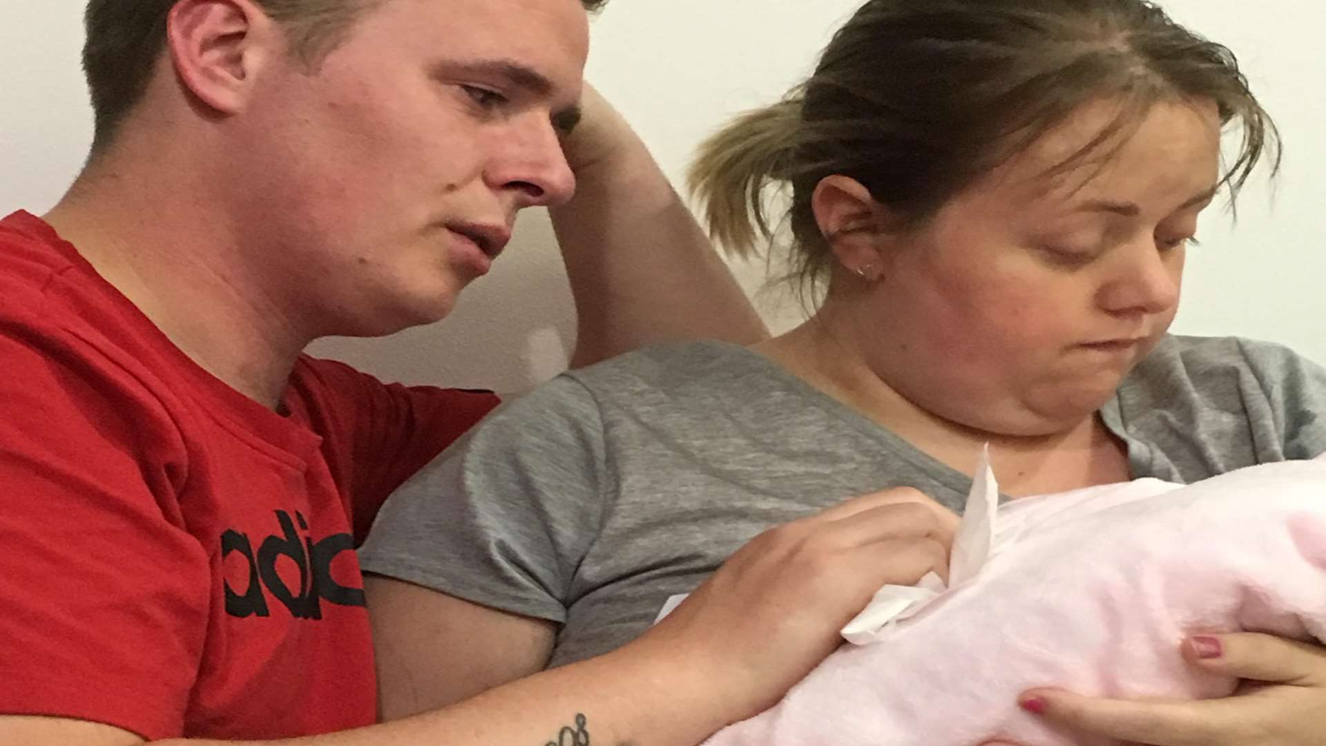 Sarah Martin and fiance Dan Townshend with baby Poppy after she passed away