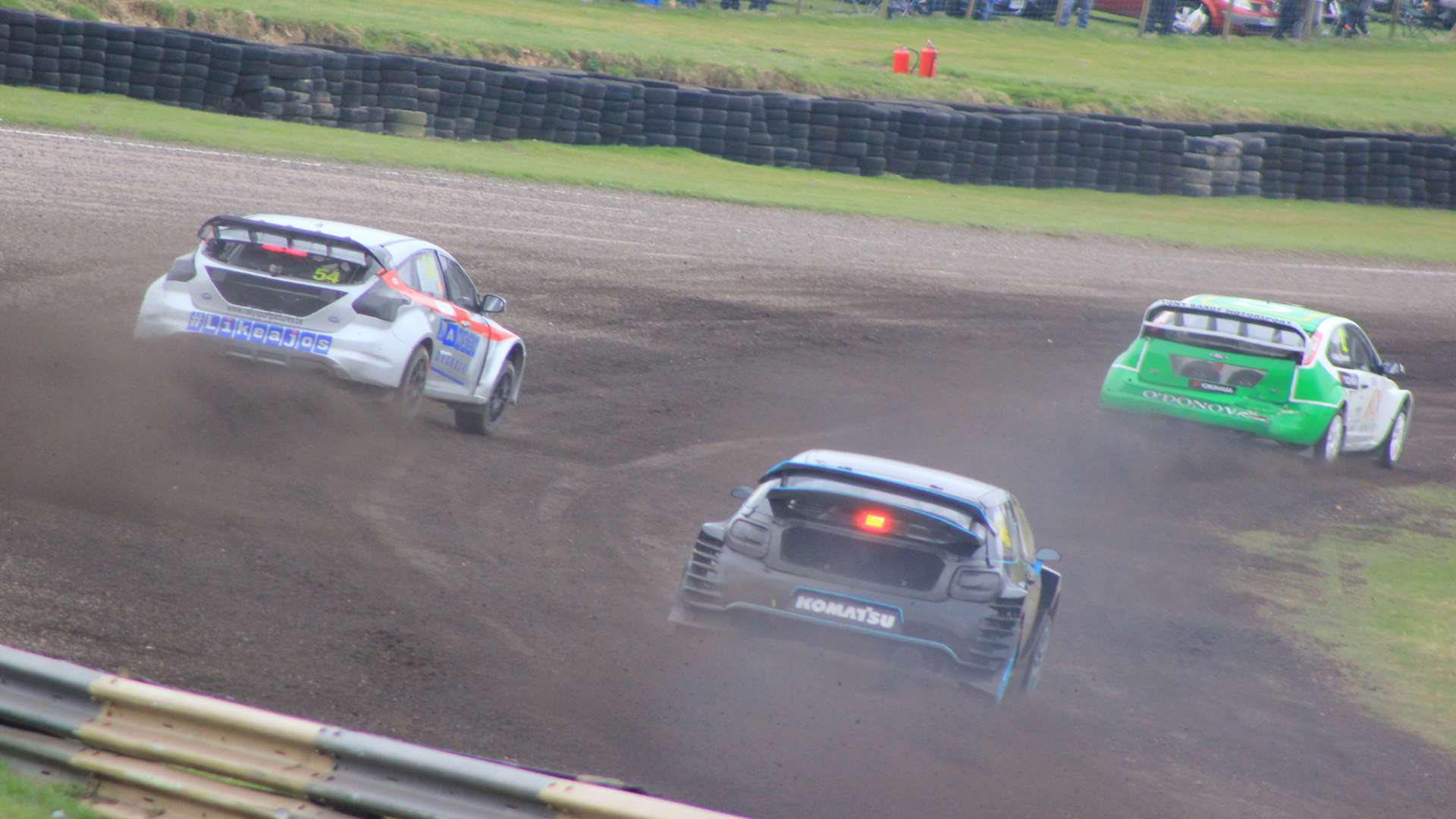 Ollie O'Donovan leads Belgian Jos Jansen and Lydden Hill owner Pat Doran in a Supercar heat. Picture: Joe Wright