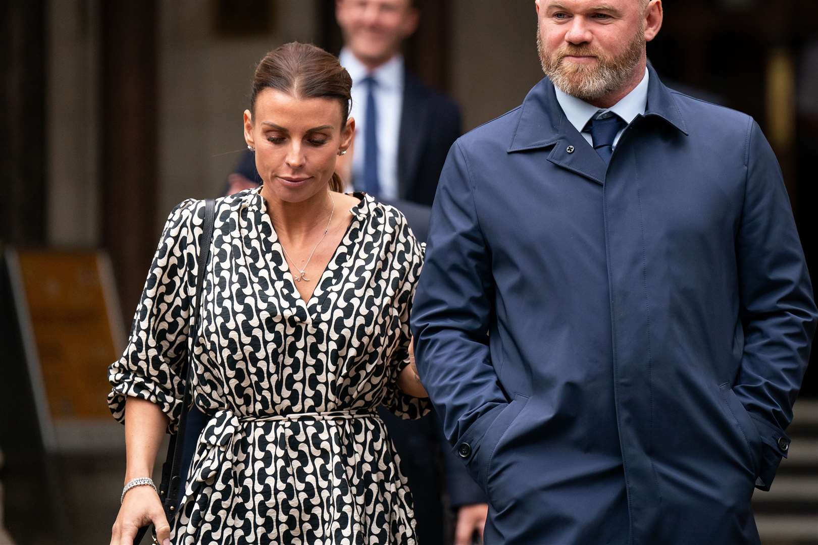 Coleen and Wayne Rooney exit the Royal Courts Of Justice in London after Wednesday’s hearing (Aaron Chown/PA)