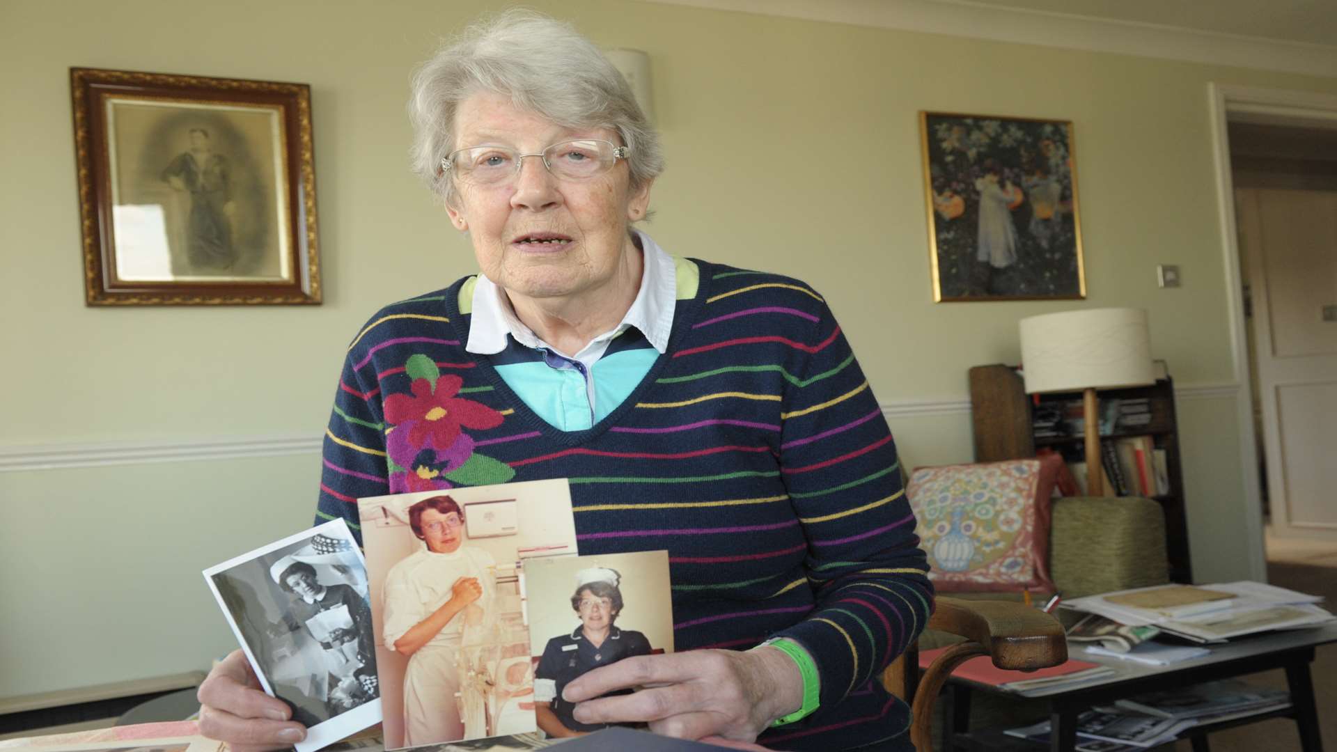 Mary Sargeant with photos from her career