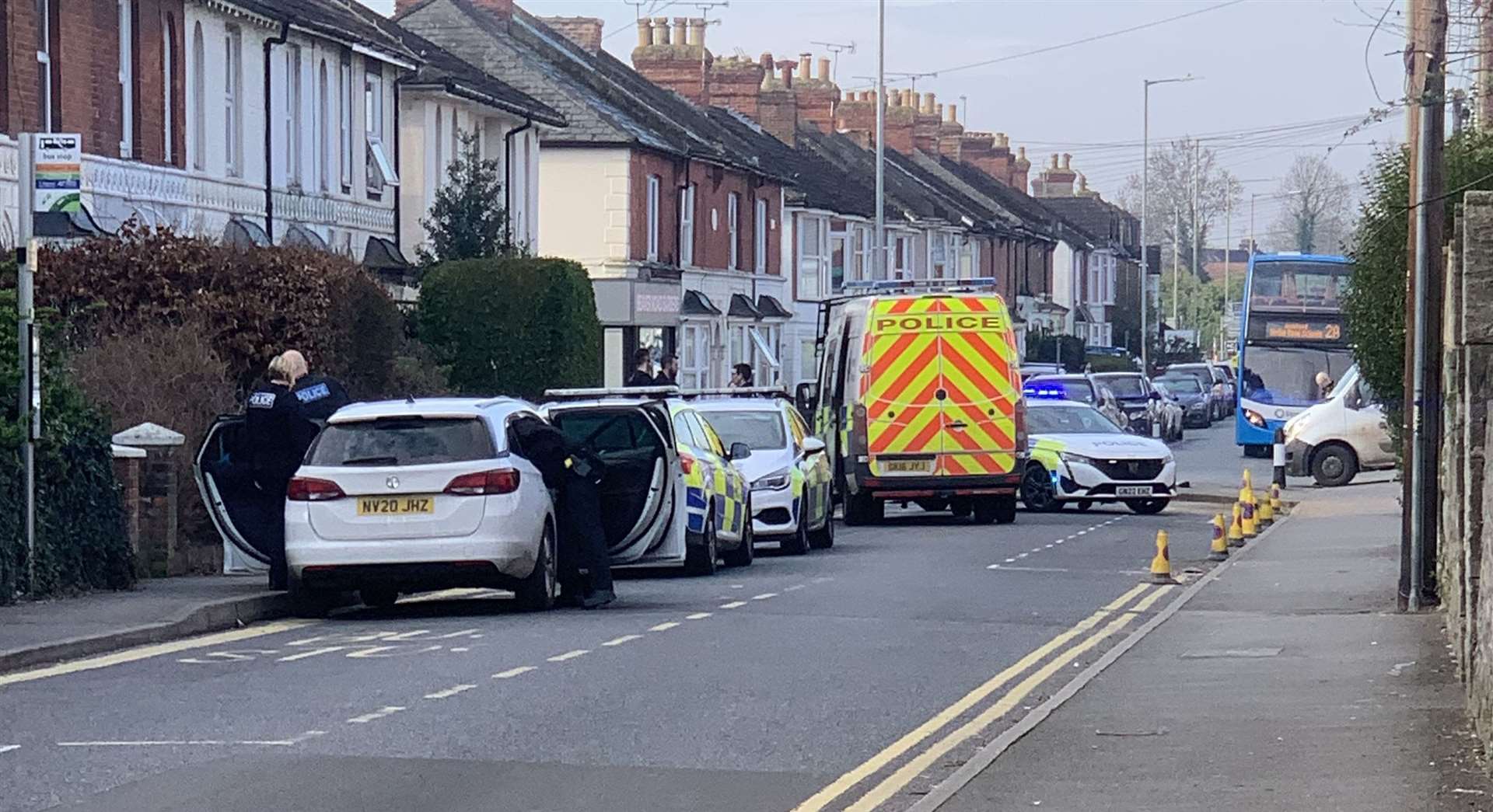 Two police cars and a police van were spotted in nearby Beaver Road