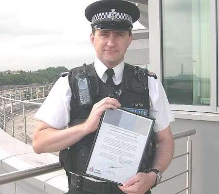 RECOGNITION: PC David Saunders with his Certificate of Merit