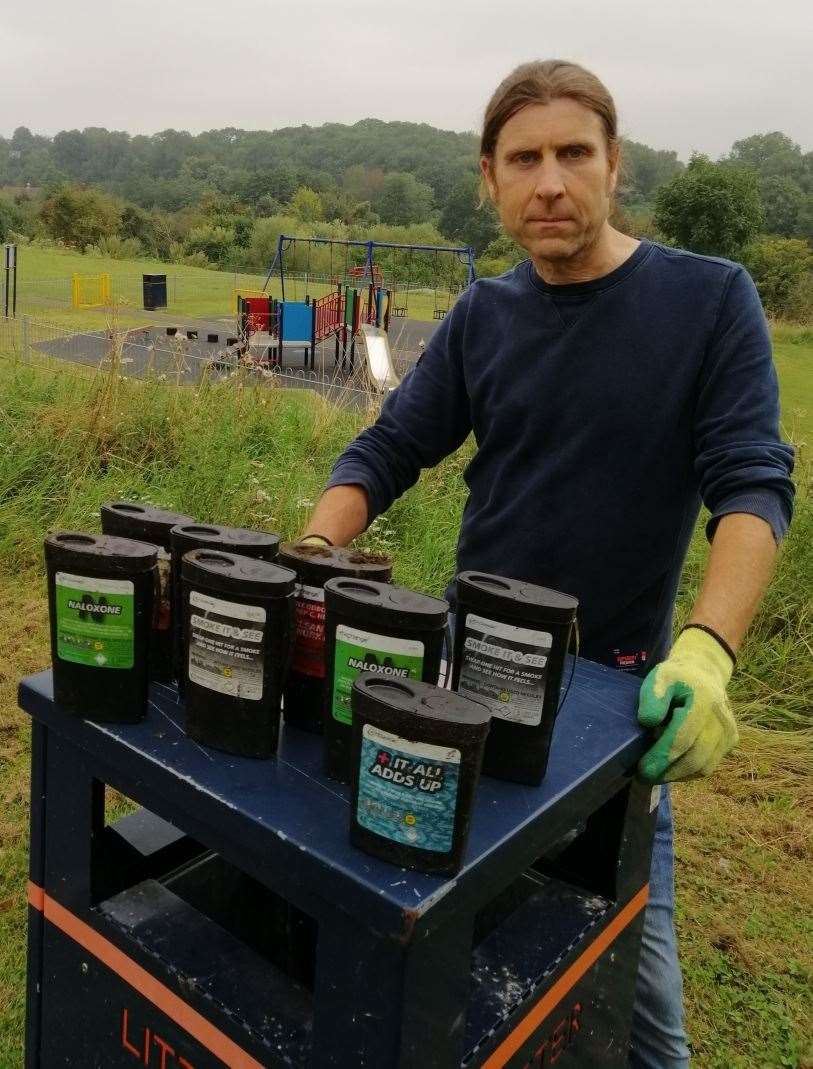 Tony Harwood with the boxes of needles he found near Dickens Road play area