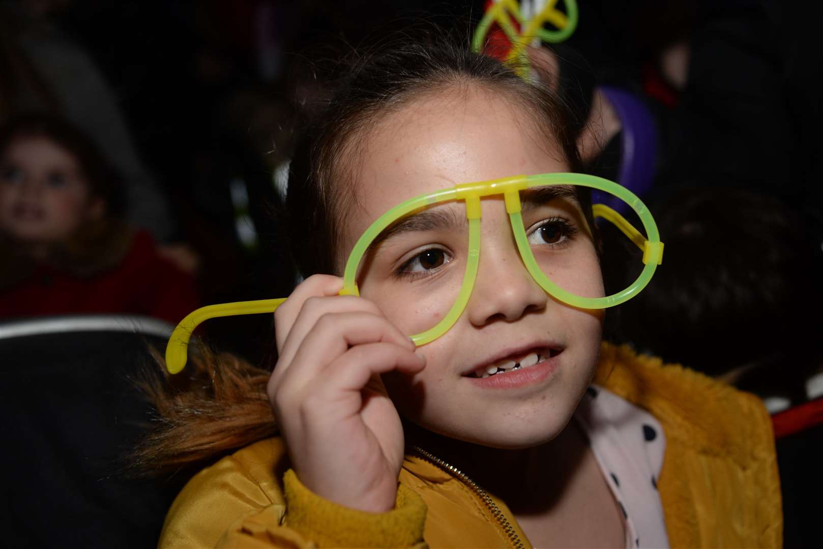Poppy Royapen, seven, wears her funky glasses at the lights switch-on in Strood. Picture: Chris Davey