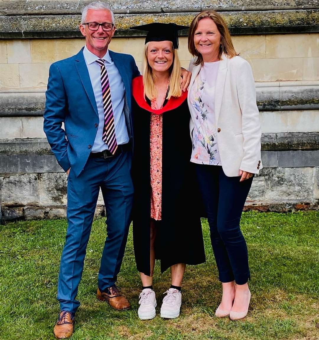 Emily, pictured with her parents, celebrated after graduating from Canterbury University. Picture: Emily Hale