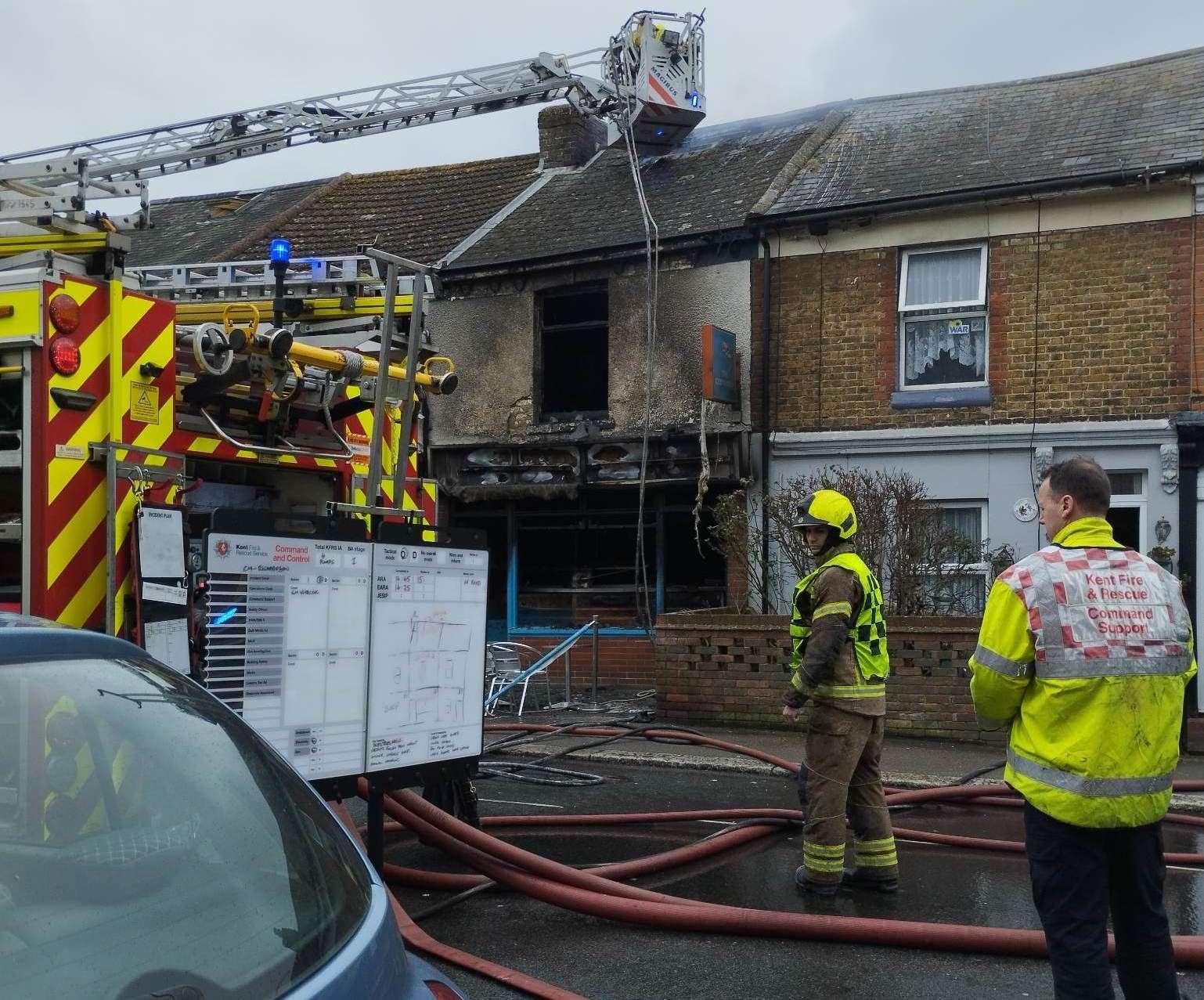 The blaze had started to spread to a flat above the shop. Picture: Katie Whitcombe