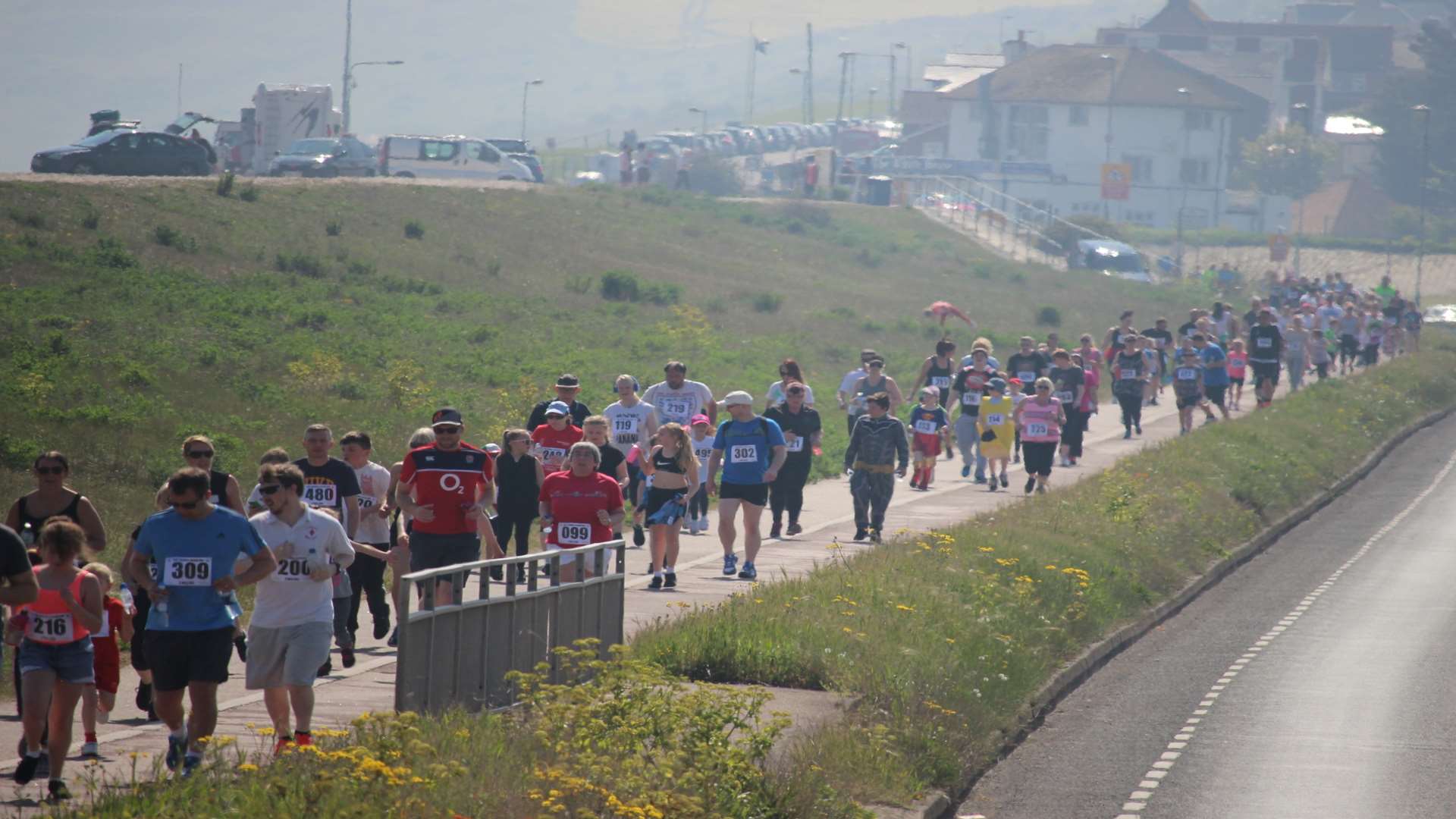 Hoards or runners and walkers along Sheppey's coast road