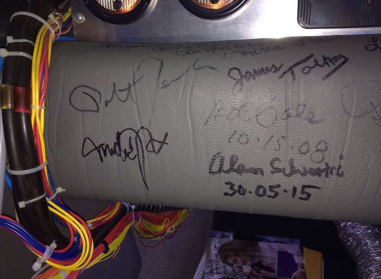 The dash is signed by the cast and crew and is the only car in the world with all the signatures.