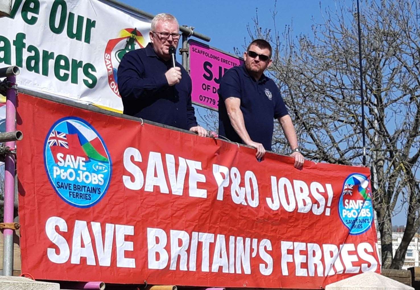 Mr Davison, pictured right, with RMT national secretary Darren Procter at one of the protests in Dover last Wednesday. Picture: Sam Lennon