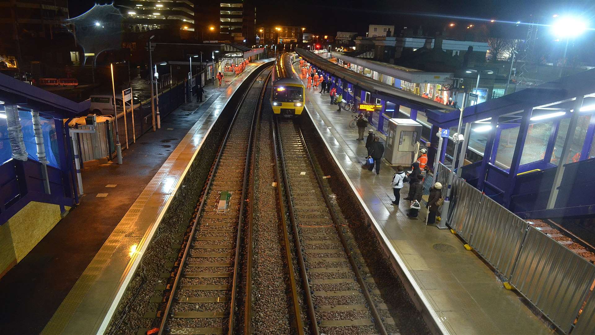 The first train makes its way into the newly opened station this morning at 4.30am. Picture: Jason Arthur