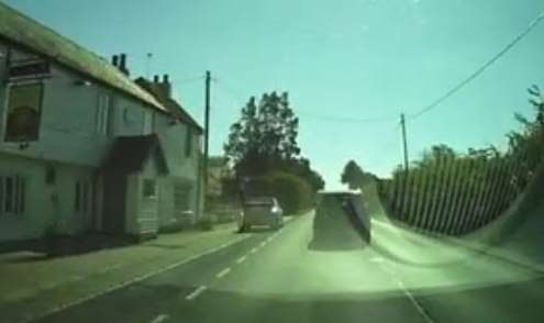 The driver of a white VW pulls off the road to avoid maniac A291 driver
