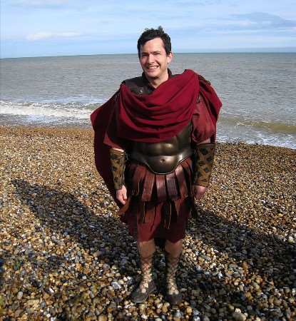 Restaurant critic Giles Coren kitted out in his Roman costume on Deal beach