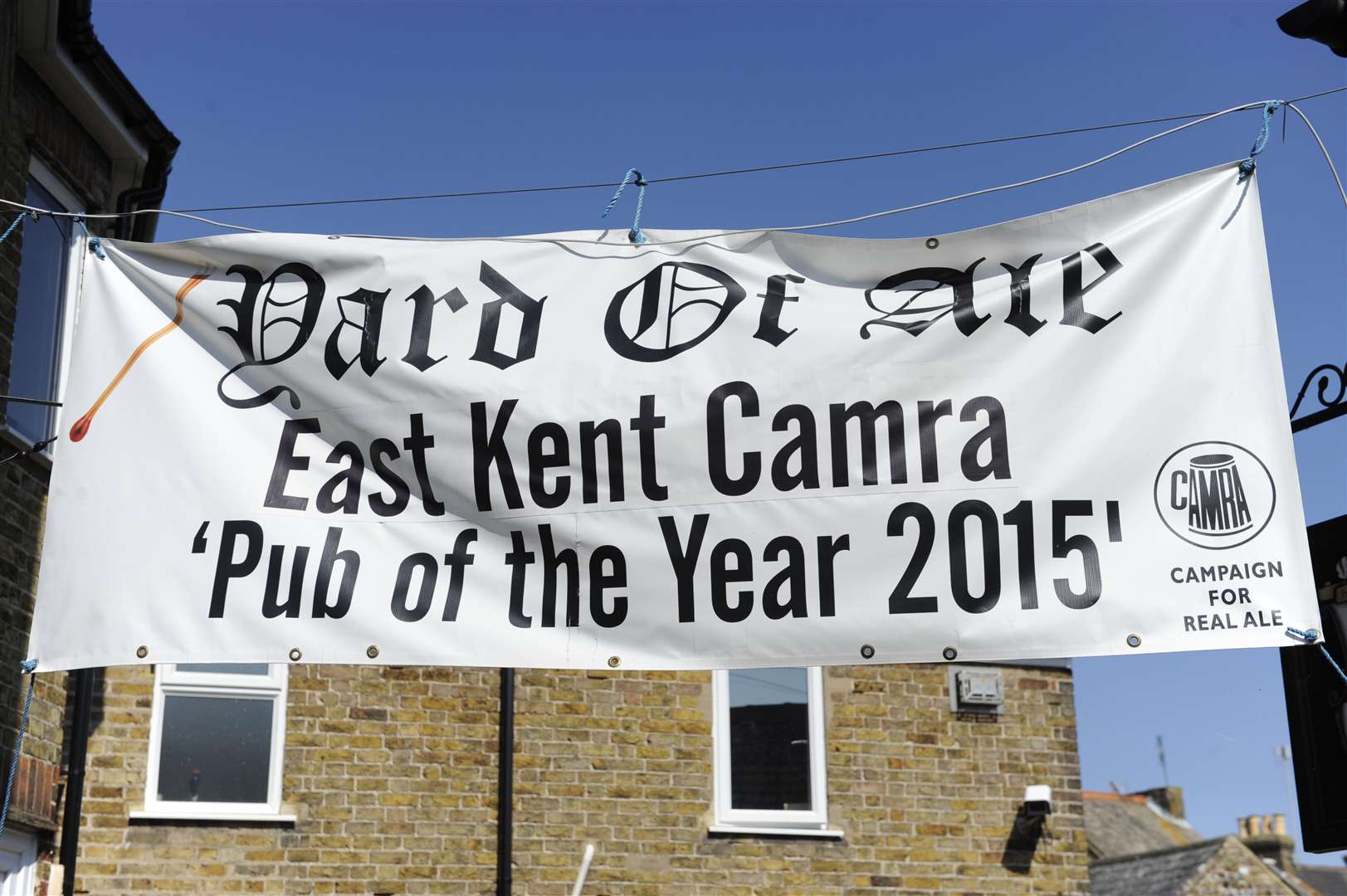 The pub is flying a banner outside