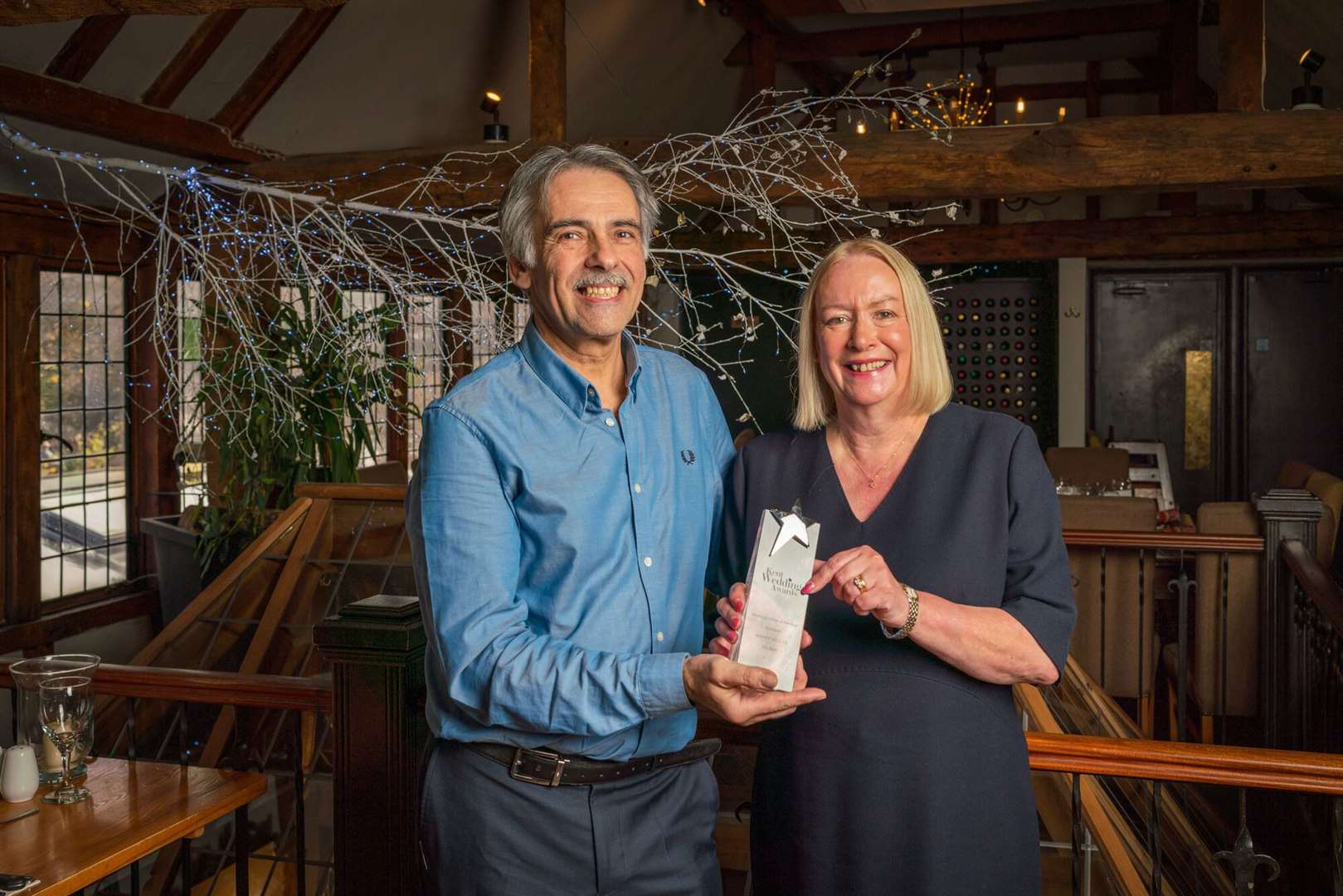 Philippe and Janet Sorak, general managers at The Barn in Tunbridge Wells, with their Kent Wedding Awards trophy