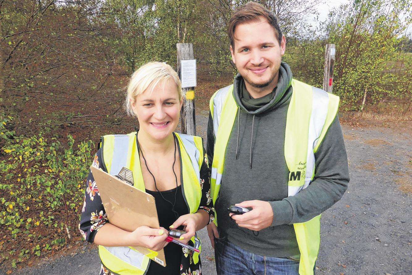 Lloyds Bank timekeepers Tara Elliott and Martin Baker of Thanet at the KM Assault Course Challenge 2014