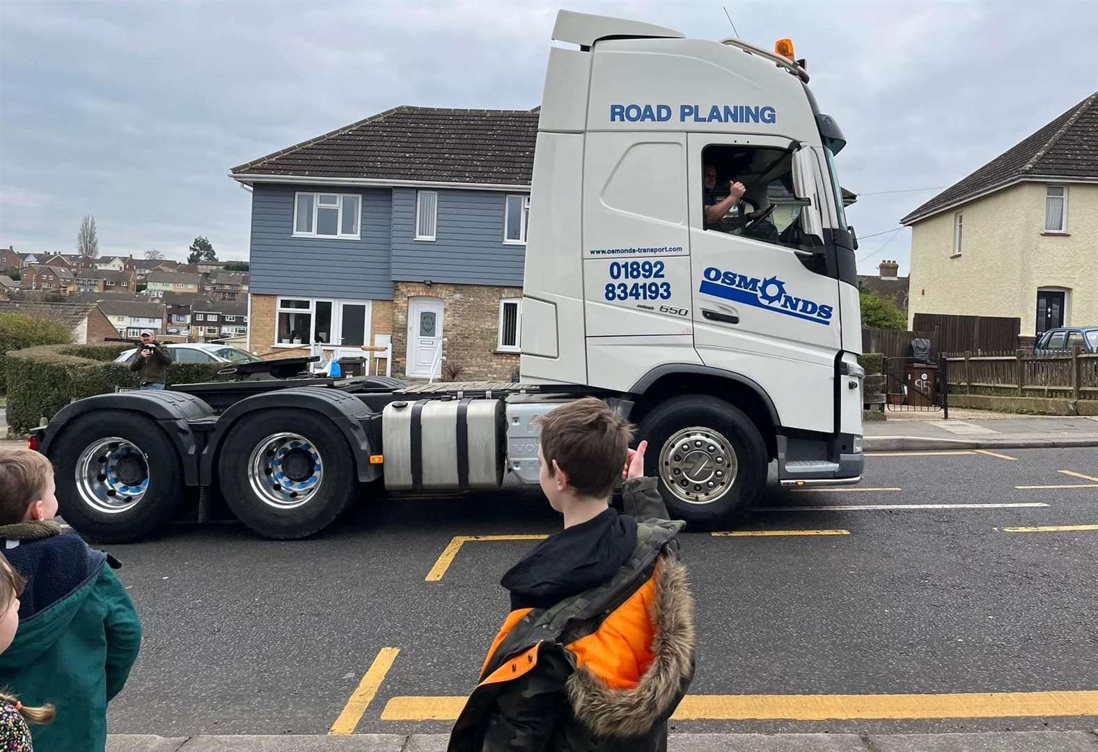 Thomas waved at the vehicles as they went past. Picture: Kerry North