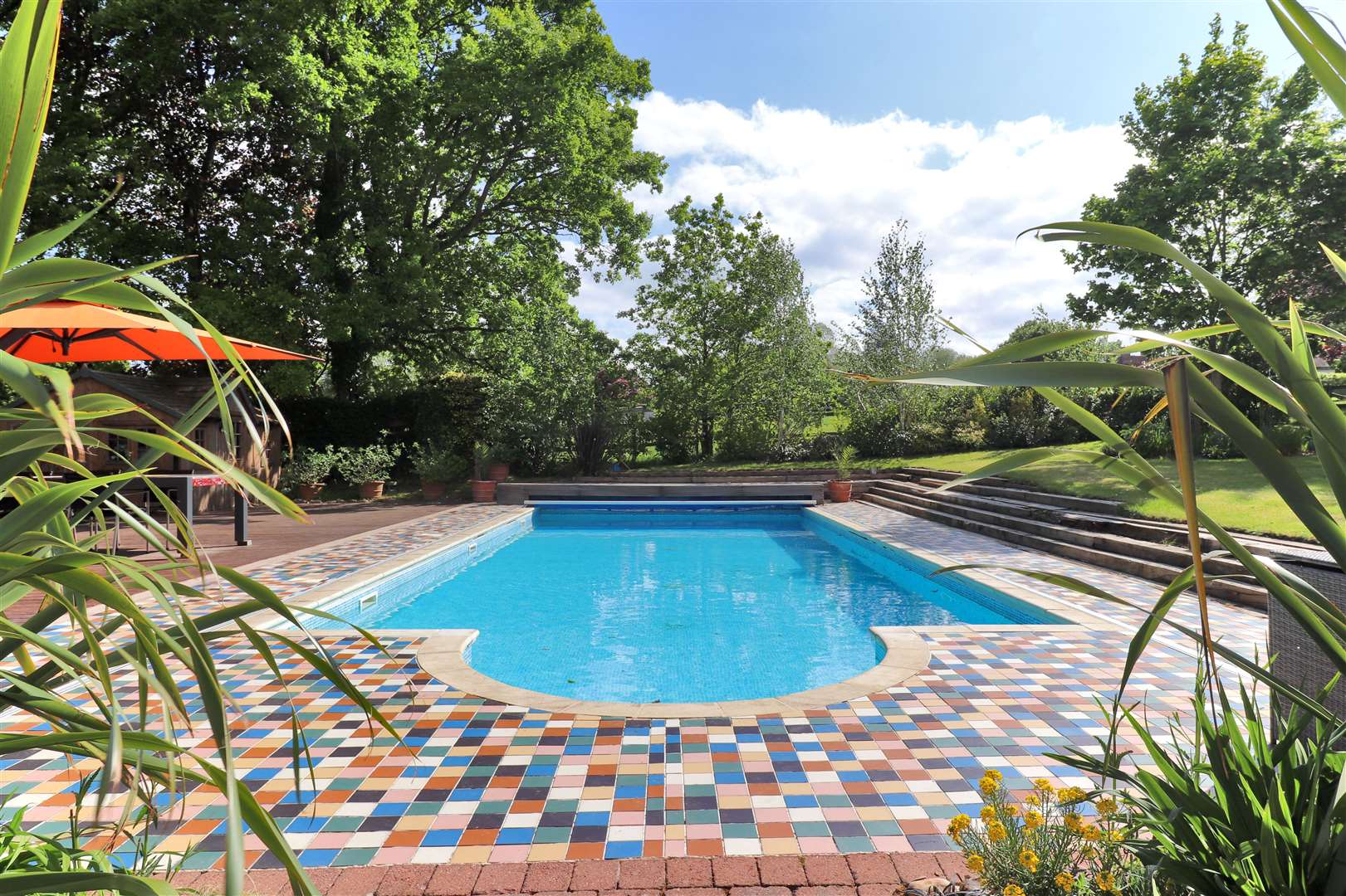 Take a dip in the heated outdoor pool or lounge on the terrace. Picture: Savills