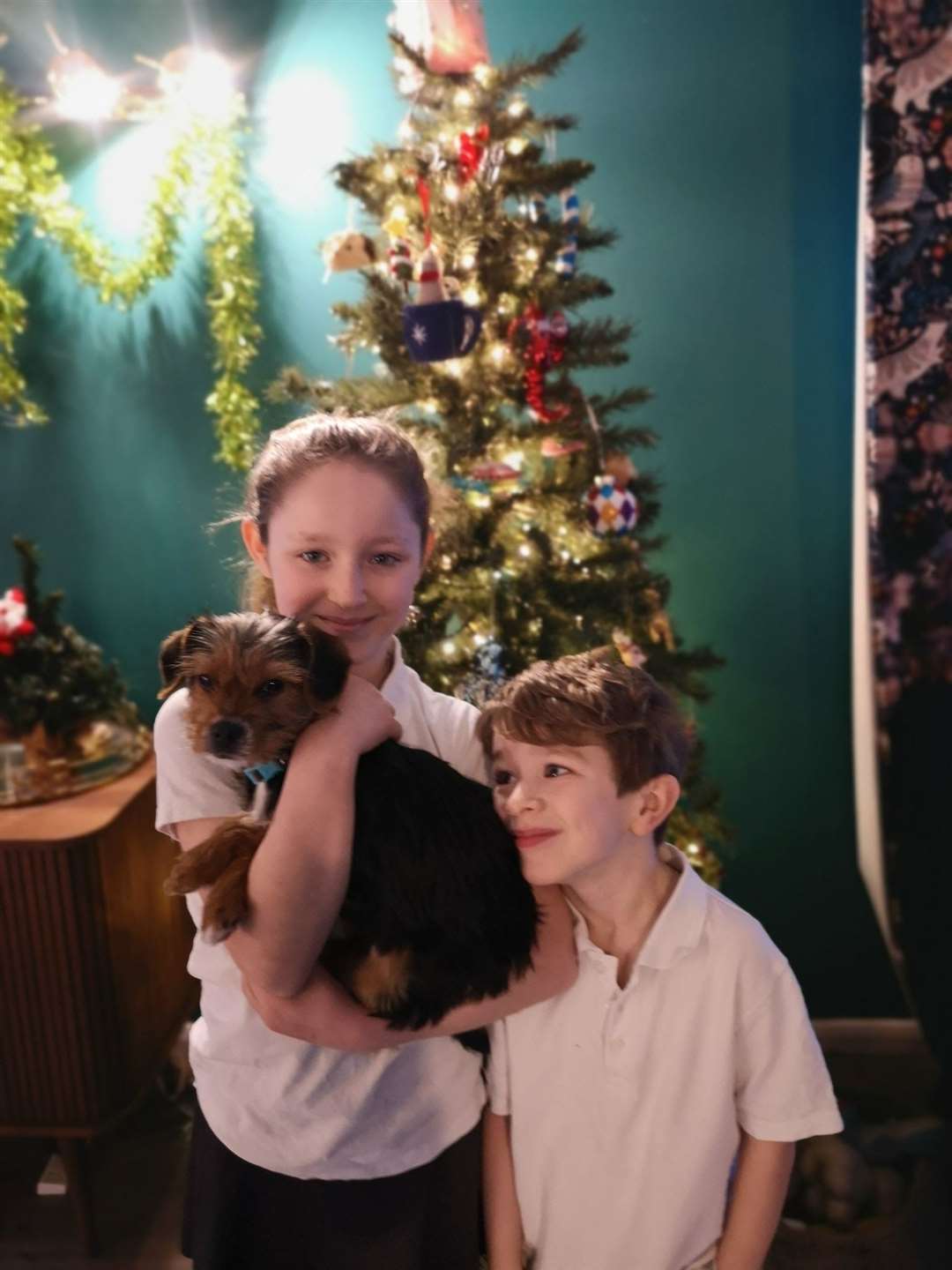 Peanut the puppy with his Tunbridge Wells family Scarlett, 9, and Felix, 6. Picture: RSPCA