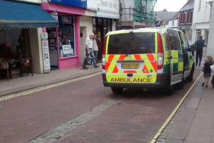 An elderly man was taken to hospital after falling over on uneven cobbles.
