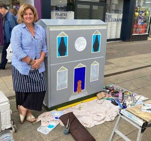 Louise Dean standing next to her artwork on a utility box in Calverley Road, Tunbridge Wells. Picture: Louise Dean