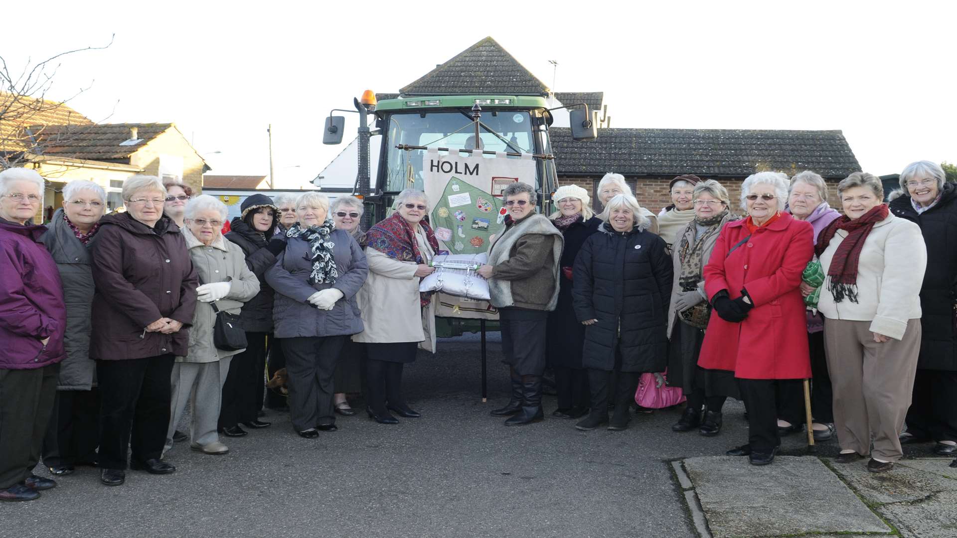 In the centre, Beryl Ravensdale and Cathie Lewis with other members of the WI