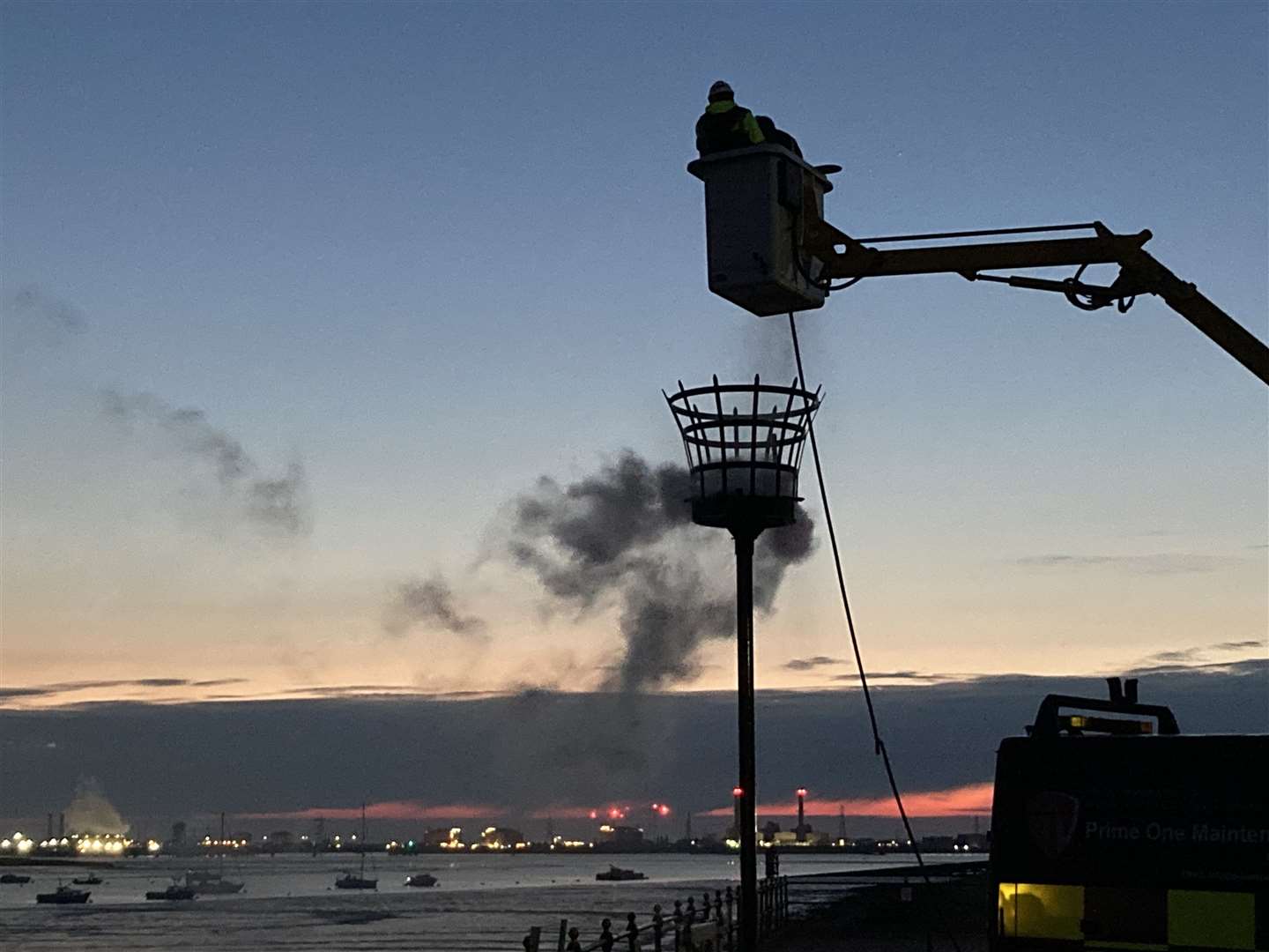 Queenborough's Platinum Jubilee Beacon extinguished at Crundall's Wharf. Picture: John Nurden