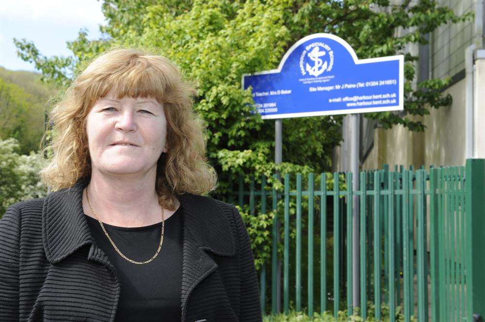 Head teacher, Denise Baker outside the school that has been rated outstanding for the third time