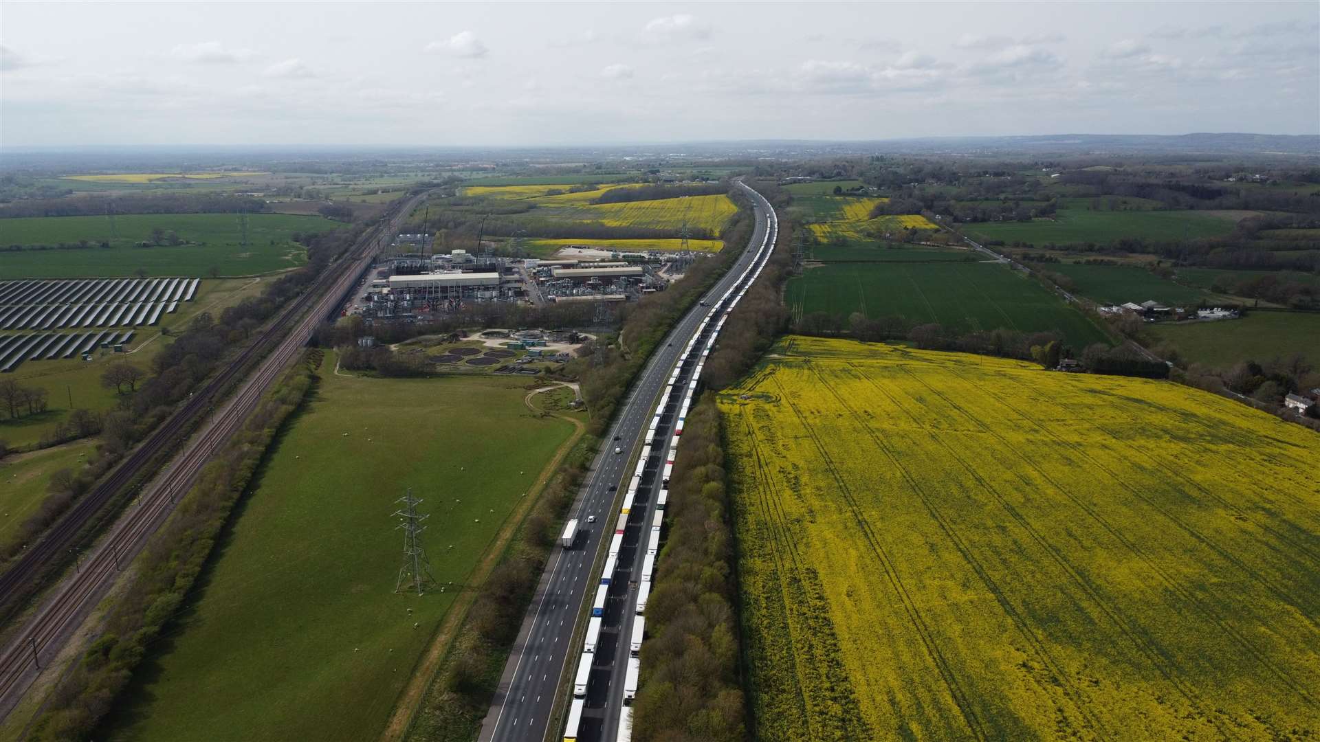 Lorries queue on the M20 motorway in Kent, near Sellindge, as part of Operation Brock earlier this month. Picture: Barry Goodwin