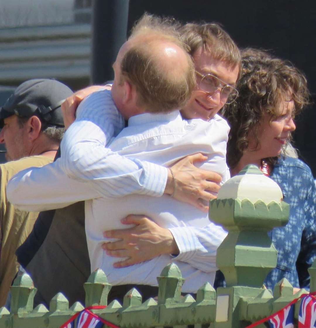 Toby Jones and Tom Brooke share a hug on Margate seafront as filming for Empire of Light, also starring Olivia Colman, approached its end. Picture: Roberto Fabiani