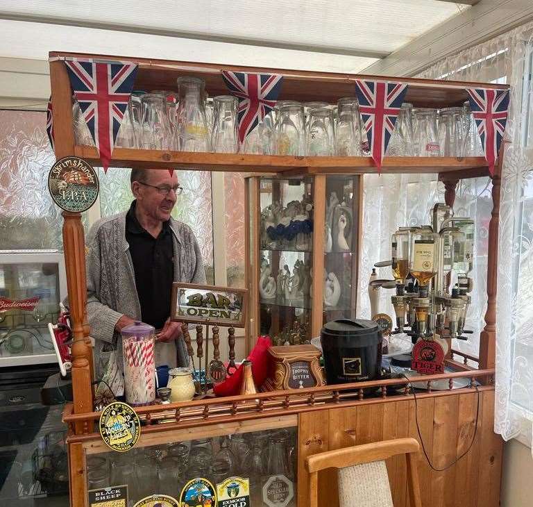 Mr Ralph behind his homemade bar