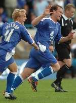 Mike Flynn and Danny Jackman celebrate Gillingham's winner. Picture: GRANT FALVEY