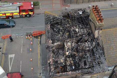 An aerial photo reveals the damage to a block of flats in Sheerness after a huge fire