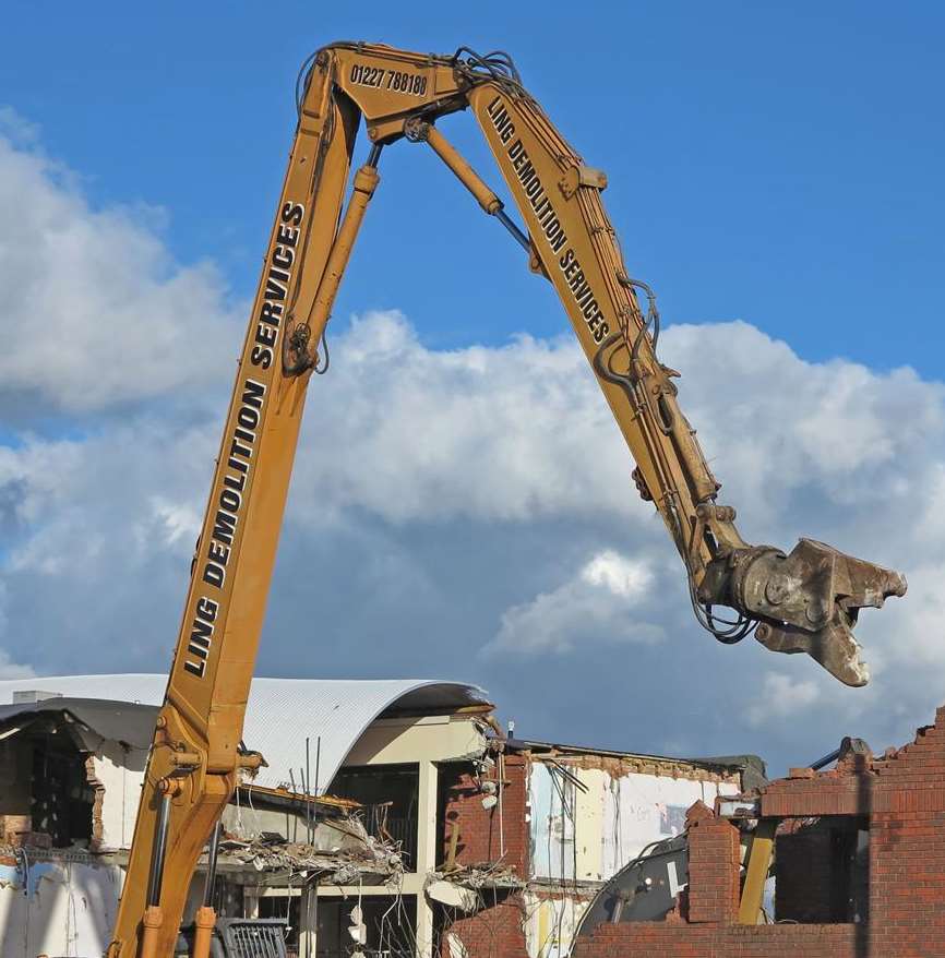 Andy Clark's picture of the giant demolition machine in action at Ashdown Court