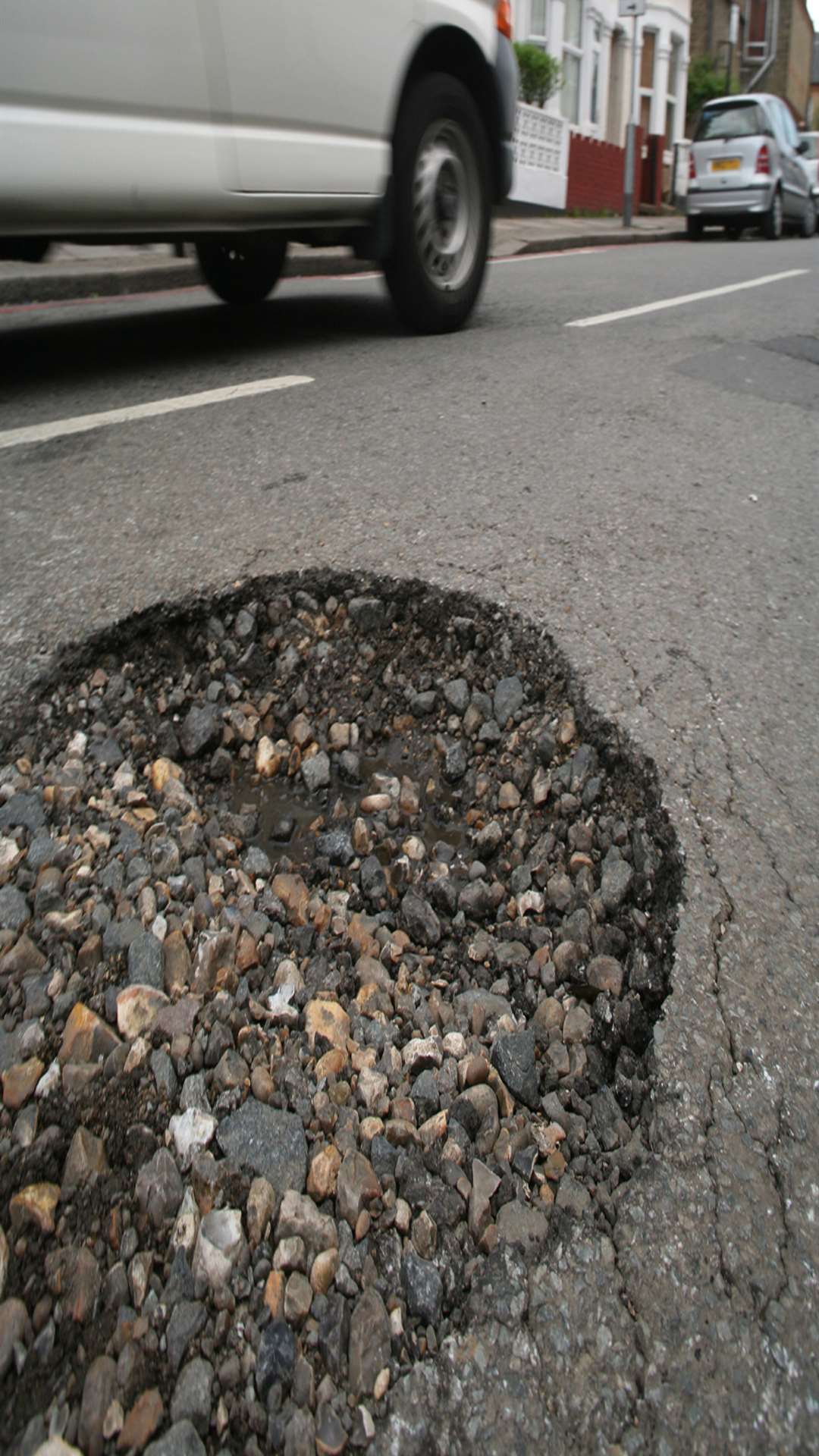 A pothole. Stock image